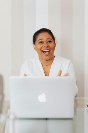 People smiling in a business setting